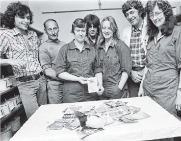  ?? PHOTO: OTAGO DAILY TIMES FILES ?? and agencies
Nine employees of the University of Otago animal breeding station at Mosgiel won first prize of $60,000 in the last $1 Golden Kiwi draw in October 1981. The rat does not seem to share the excitement of his keepers over their win. The syndicate members who were on duty at the time of the photo were (from left) David Milne, John Bottomley, Rosemary Kerr (holding the winning ticket), Glen McGregor, Lousie Brough, Terry Blain and Lillias Anderson.