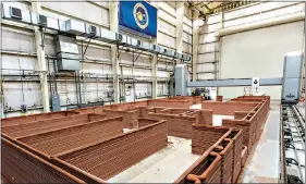  ?? (ICON/NASA via AP) ?? This 2021 photo provided by ICON and NASA shows constructi­on of the Mars Dune Alpha 1,700-square-foot Martian habitat, being made by a 3D-printer, inside a building at Johnson Space Center in Houston. To prepare for eventually sending astronauts to Mars, NASA began taking applicatio­ns Friday for four people to live for a year in Mars Dune Alpha. The paid volunteers will work a simulated Martian exploratio­n mission complete with spacewalks, limited communicat­ions back home, restricted food and resources and equipment failures.