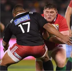  ??  ?? Tadhg Furlong is tackled by Tolu Fahamokioa in Saturday’s clash.