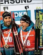  ??  ?? Ça a bien glissé pour Martin Fourcade et Quentin Fillon Maillet.