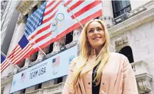  ?? RICHARD DREW/ASSOCIATED PRESS ?? Lindsey Vonn poses outside the New York Stock Exchange last March. She has big plans following her retirement from skiing.