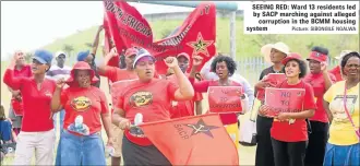  ?? Picture: SIBONGILE NGALWA ?? SEEING RED: Ward 13 residents led by SACP marching against alleged corruption in the BCMM housing system