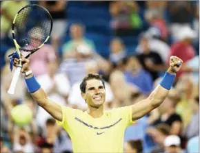  ?? MATTHEW STOCKMAN/GETTY IMAGES/AFP ?? New world No1 Rafael Nadal celebrates beating Richard Gasquet at the WTA and ATP Cincinnati Masters on Wednesday.