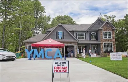  ?? CARRIE GARLAND — FOR THE NEWS-HERALD ?? The 2017 Lake County YMCA Dream House, 5295 SOM Center Road, Willoughby, was opened for tours July 1. Tours run seven days a week through Aug. 6.