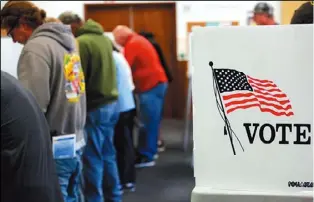  ??  ?? 威斯康辛州選舉委員會­13日公布選舉舞弊調­查報告，指出該州至少60個1­7歲的未成年人曾非法­投票。(Getty Images)