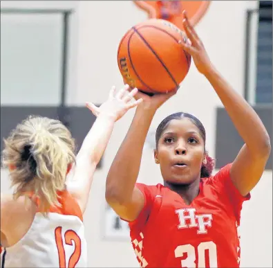  ?? JEFF KRAGE/DAILY SOUTHTOWN ?? Homewood-Flossmoor’s Grace Hall takes a shot against Lincoln-Way West during a game on Jan. 7, 2020.