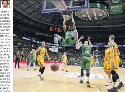  ??  ?? CON FUERZA. Jeff Brooks machaca el aro del Gran Canaria. El Unicaja jugará la Copa del Rey.