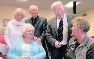  ??  ?? ●●Lord Lieutenant of Manchester agent Tony Burns talked to members of some of the groups using Syke Community Base