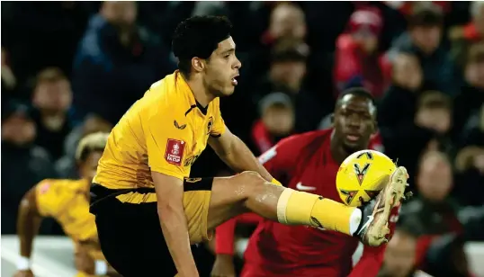  ?? Photo: CNA ?? Held… Holders Liverpool were held to a 2-2 home draw by Wolverhamp­ton Wanderers in the FA Cup on Saturday.