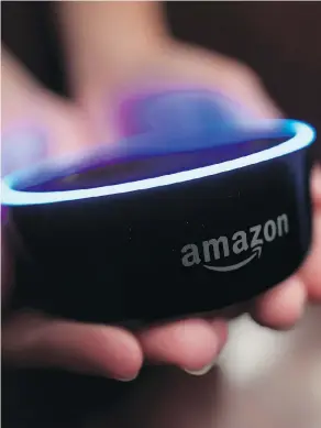  ?? MIKE STEWART / THE ASSOCIATED PRESS FILES ?? The puck-sized Amazon Echo Dot one of the company’s best-selling devices, and promoted with 70 per cent better sound than its predecesso­rs.