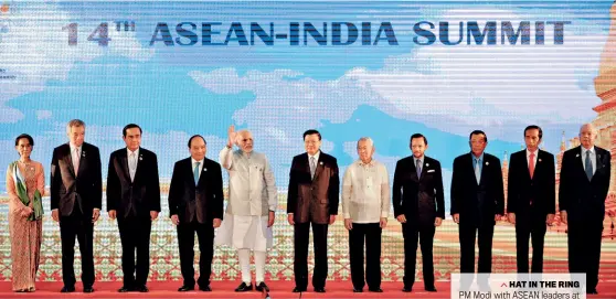  ?? NOEL CELIS/GETTY IMAGES ?? HAT IN THE RING PM Modi with ASEAN leaders at the 2016 summit in Vientiane