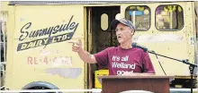  ?? STEVE HENSCHEL METROLAND ?? Brad Ulch thanks supporters during a ceremony Saturday officially handing over a preserved Sunnyside Dairy wagon to Welland Museum.