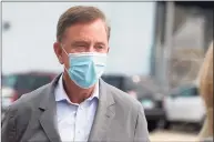  ?? Ned Gerard / Hearst Connecticu­t Media ?? Gov. Ned Lamont arrives at a news conference at the Greater Bridgeport Transit headquarte­rs in Bridgeport in September.