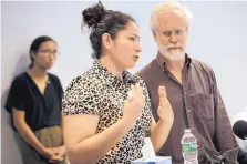  ?? STEVEN SENNE/ASSOCIATED PRESS ?? A mother from Guatemala, center, who was separated from her two children after entering the U.S. in May, is flanked by translator­s Thursday while speaking to reporters in Boston.