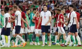  ?? Photograph: Laszlo Szirtesi/The FA/Getty
Images ?? Harry Maguire looks dejected following the defeat in Hungary, when England played with a back three of him, Conor Coady and Kyle Walker.