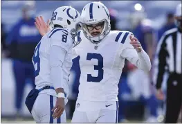  ?? ADRIAN KRAUS — THE ASSOCIATED PRESS ?? The Indianapol­is Colts’ Rodrigo Blankenshi­p (3) celebrates with former Hamilton High and Butte College standout Rigoberto Sanchez (8) after kicking a field goal during the first half of a wild-card playoff game Saturday in Orchard Park, N.Y.