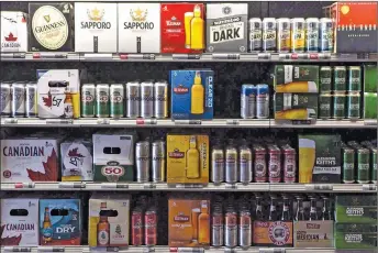 ?? CP PHOTO ?? Products are on display at a Toronto beer store.