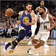  ?? JOSE CARLOS FAJARDO/TRIBUNE NEWS SERVICE ?? Golden State Warriors' Stephen Curry (30) drives past San Antonio Spurs' Patty Mills (8) during the NBA Western Conference Finals on Monday in San Antonio, Texas.