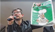  ?? FOTO: DPA ?? Der französisc­he Zeichner Rénald Luzier, genannt Luz, will keine Mohammed-Karikature­n mehr zeichnen. Das Satiremaga­zin „Charlie Hebdo“steckt vier Monate nach dem Anschlag in der Krise.
