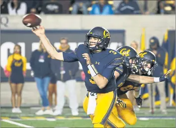  ?? PHOTOS BY JIM GENSHEIMER — STAFF PHOTOGRAPH­ER ?? Cal’s starting quarterbac­k last season, Ross Bowers, will face competitio­n this spring from transfer Brandon McIlwain.