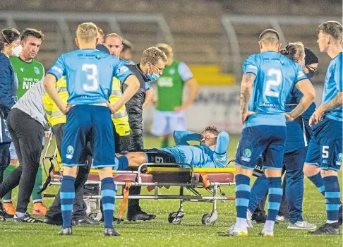  ?? ?? AGONY: Darren Whyte is stretchere­d off during Forfar’s clash with Hibernian in October 2020.