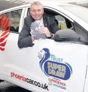  ??  ?? DRIVING A BARGAIN Boyd promotes SPFL Trust’s Superdraw where a fan can win a Phoenix Hyundai car