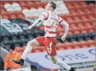  ?? PICTURE: MARIE CALEY ?? POINT WINNER: Doncaster Rovers’ Alfie Beestin scored late on to claim a draw for Darren Ferguson’s side last night.