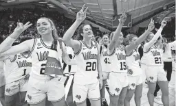  ?? MATT ROURKE/AP ?? Villanova players, including Maddy Siegrist (20), celebrate after beating Cleveland State.