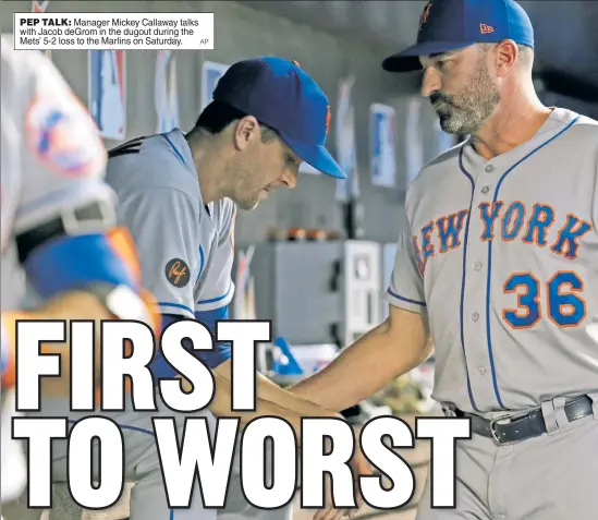  ?? AP ?? PEP TALK: Manager Mickey Callaway talks with Jacob deGrom in the dugout during the Mets’ 5-2 loss to the Marlins on Saturday.