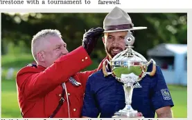  ?? REX ?? Hat’s better: a Canadian Mountie gives Johnson his Stetson