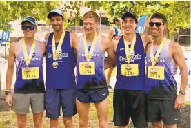  ??  ?? Alex Price, left, Trevor Conde, Colin Abert, Alex Fitch and Andy Wells set the record for relay teams Sunday at the annual St. Luke’s Via Marathon.