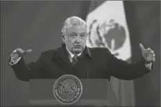  ?? ASSOCIATED PRESS ?? N THIS DEC. 18, 2020, FILE PHOTO, Mexican President Andres Manuel Lopez Obrador gives his daily morning news conference at the presidenti­al palace, Palacio Nacional, in Mexico City. López Obrador on Sunday said he has tested positive for COVID-19 and is under medical treatment.