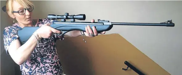  ??  ?? Jolene Shields posted an image of herself on social media holding what appeared to be an air rifle. She has since said it was in fact “a toy”.