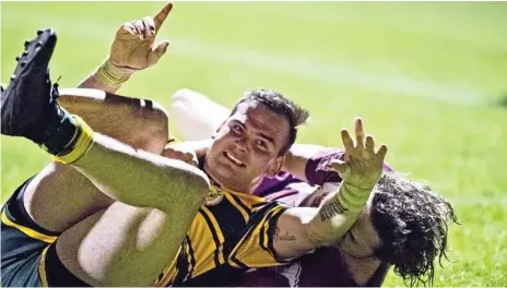  ?? Photo: Nev Madsen ?? GAME OVER: Wattles winger Braydon Wilson celebrates an intercept try against Dalby.