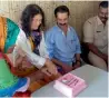  ?? — PTI ?? Irom Sharmila cuts cake with friends on her 45th birthday at a rehabilita­tion centre at Madathukka­d, Kerala.