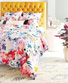  ?? ANTHROPOLO­GIE ?? The Floral Bedding Collection by artist Lillian Farag for Anthropolo­gie features a colourful, striking design.