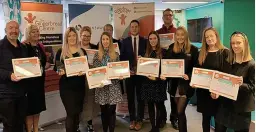  ?? ?? Certificat­e and award winners with Gingerbrea­d Centre chief executive Ann Ewens and Leah Hodgkinson, of Swansway Group.