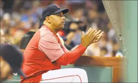  ?? Elise Amendola / Associated Press ?? Manager Alex Cora and the Red Sox are on pace to put together the best season in team history.