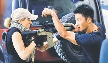  ??  ?? Jacky Wu behind the scenes during the filming of ‘Wolf Warriors 2’.