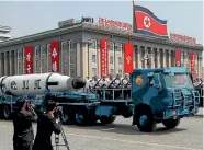  ?? PHOTO: REUTERS ?? A North Korean navy truck displays a submarine-launched ballistic missile during a military parade in Pyongyang in April.