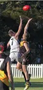  ?? PHOTO: NEV MADSEN ?? TAP TUSSLE: Coolaroo ruckman Benjamin Sercombe battles with Toowoomba Tigers rival Trent Ballin in their AFL Darling Downs game at Rockville Park.