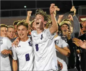  ?? AUSTIN HERTZOG — DIGITAL FIRST MEDIA ?? Phoenixvil­le’s Kyle Tucker (9) and Tyler Siefer (6) lead the celebratio­n after the Phantoms won the PAC boys soccer title.