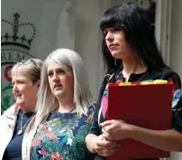  ?? AP ?? Northern Ireland campaigner for Amnesty Internatio­nal Grainne Teggart and campaigner Sarah Ewart leaves the Supreme Court in London on Thursday. —