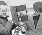  ?? RYU YOUNG-SUK/YONHAP VIA AP ?? Massacre survivor Nguyen Thi Thanh speaks via computer outside the court in Seoul, South Korea, Tuesday.