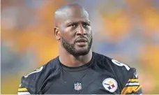  ?? CHARLES LECLAIRE, USA TODAY SPORTS ?? The Steelers’ James Harrison coached one of the teams in the Pro Football Arm Wrestling Championsh­ip in Las Vegas.