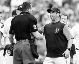  ?? DUANE BURLESON/AP ?? Tigers manager Brad Ausmus called umpires’ recent protest over their treatment “petty.”