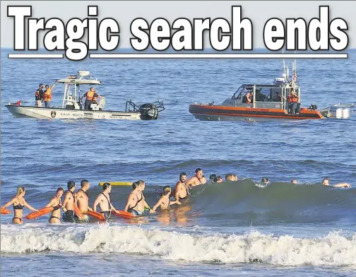  ??  ?? DESPERATE: A line of lifeguards in Long Beach on Tuesday joins the search for the youngster, who had been swimming with his brother.