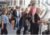  ?? JOE RAEDLE, GETTY IMAGES ?? Internatio­nal travelers arriving at the Miami airport use passport control kiosks.