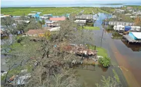  ?? GERALD HERBERT/AP ?? HUD hopes to incentiviz­e developers through grants and tax credits to build resilient infrastruc­ture that is energy- and water-efficient.