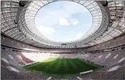  ?? AP PHOTO BY DENIS TYRIN ?? This 2017, file photo shows the refurbishe­d Luzhniki stadium in Moscow, Russia, where the opening match and final of the World Cup will be played when the soccer world gathers at 12 stadiums in 11 cities across the European portion of Russia starting June 14 for a 32-day, 64-match championsh­ip.